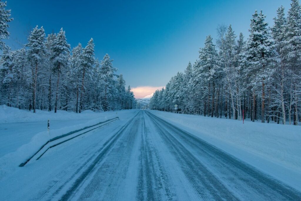 Relatively clear road on a winter road trip from Tromso to Senja