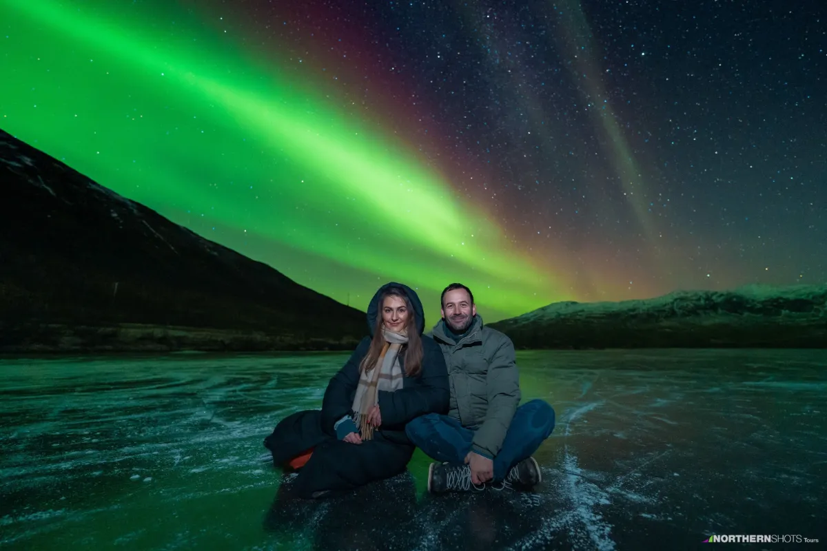 Best northern lights tours in Tromso. Northern Shots provide tours in a big buses.